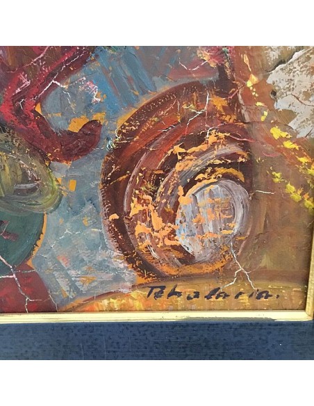 Signature of painter Igor Tcholaria on his colorful circus painting with harlequins and clowns against blue background