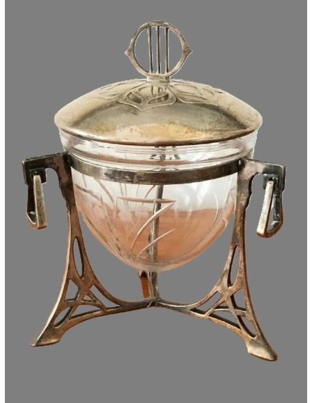 Art Nouveau lidded jar made of cut glass in silver-plated brass on feet by WMF.