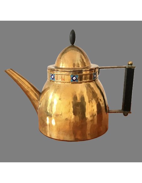 Art Nouveau teapot made of hammered brass with bluish enamel inlay as a border on the upper rim and ebony handle