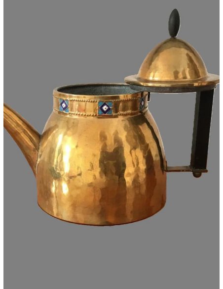 Art Nouveau teapot made of hammered brass with bluish enamel inlay as a border on the upper rim and ebony handle