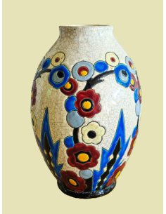 Art Deco ceramic vase with stylized flowers in blue, yellow, red and black on a light background, designed by Charles Catteau.