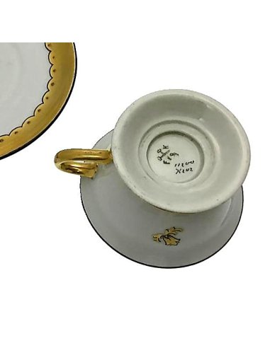Friedrich Kästner porcelain mark on Art Deco cup with decorative gilding and black solder