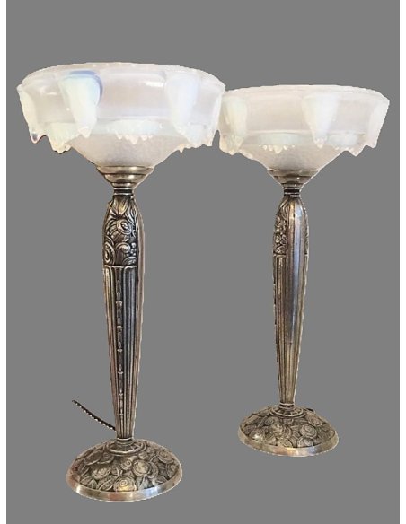 Pair of table lamps by Ezan on silver bronze base with open shades made of opalescent glass, shaped in stalactites.