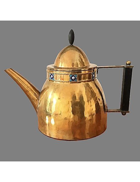 Art Nouveau teapot made of hammered brass with a bluish enamel inlay as a border at the top and an ebony handle.